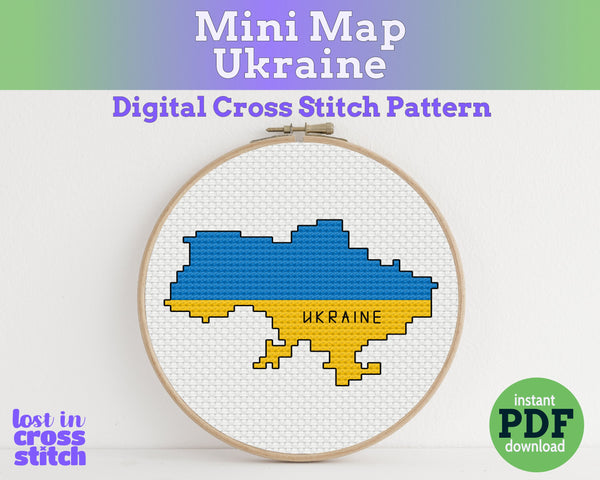 Cross-stitch pattern of Ukraine's flag in an embroidery hoop on a white background